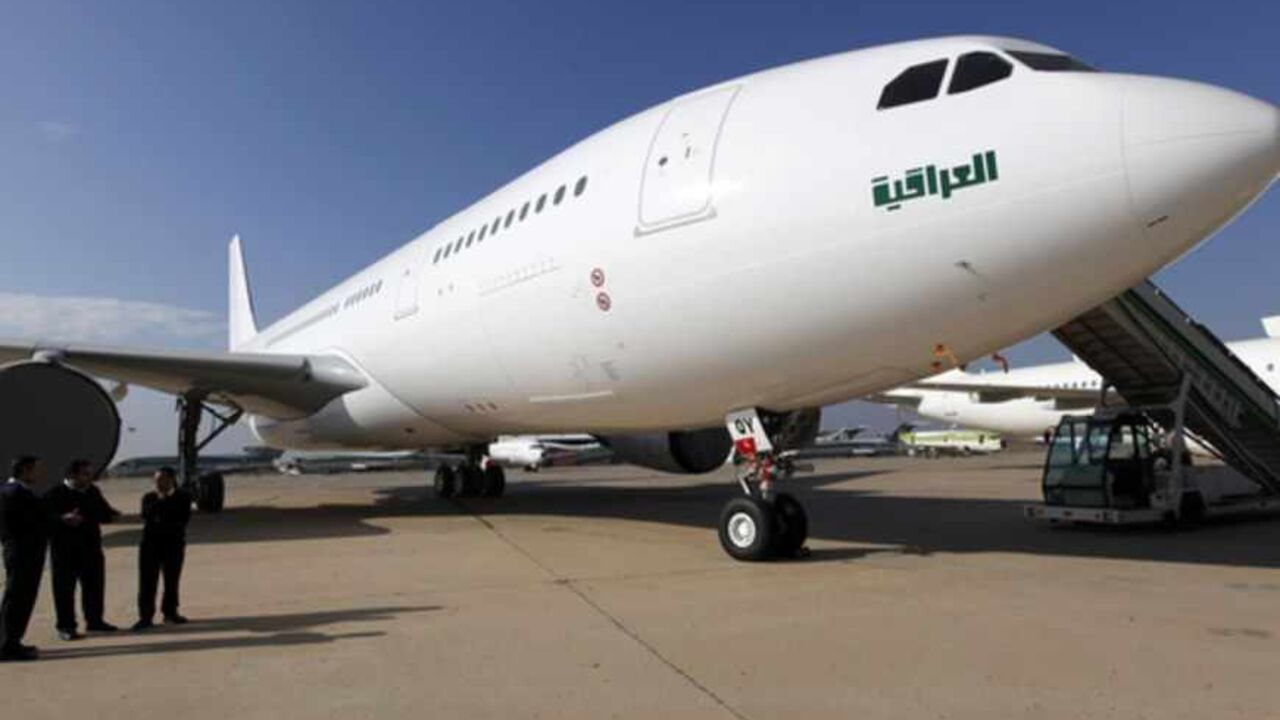 Iraqi pilots stand near a Boeing 777 jet at Baghdad's international Airport Iraqi pilots stand near a Boeing 777 jet at Baghdad's international Airport December 15, 2012. Three Boeing twin-aisle 777-200LR jets arrived in Baghdad in a move aimed to boost the transportation sector in a country suffering decades of wars and sanctions. REUTERS/Mohammed Ameen (IRAQ - Tags: POLITICS TRANSPORT BUSINESS) - RTR3BLS6
