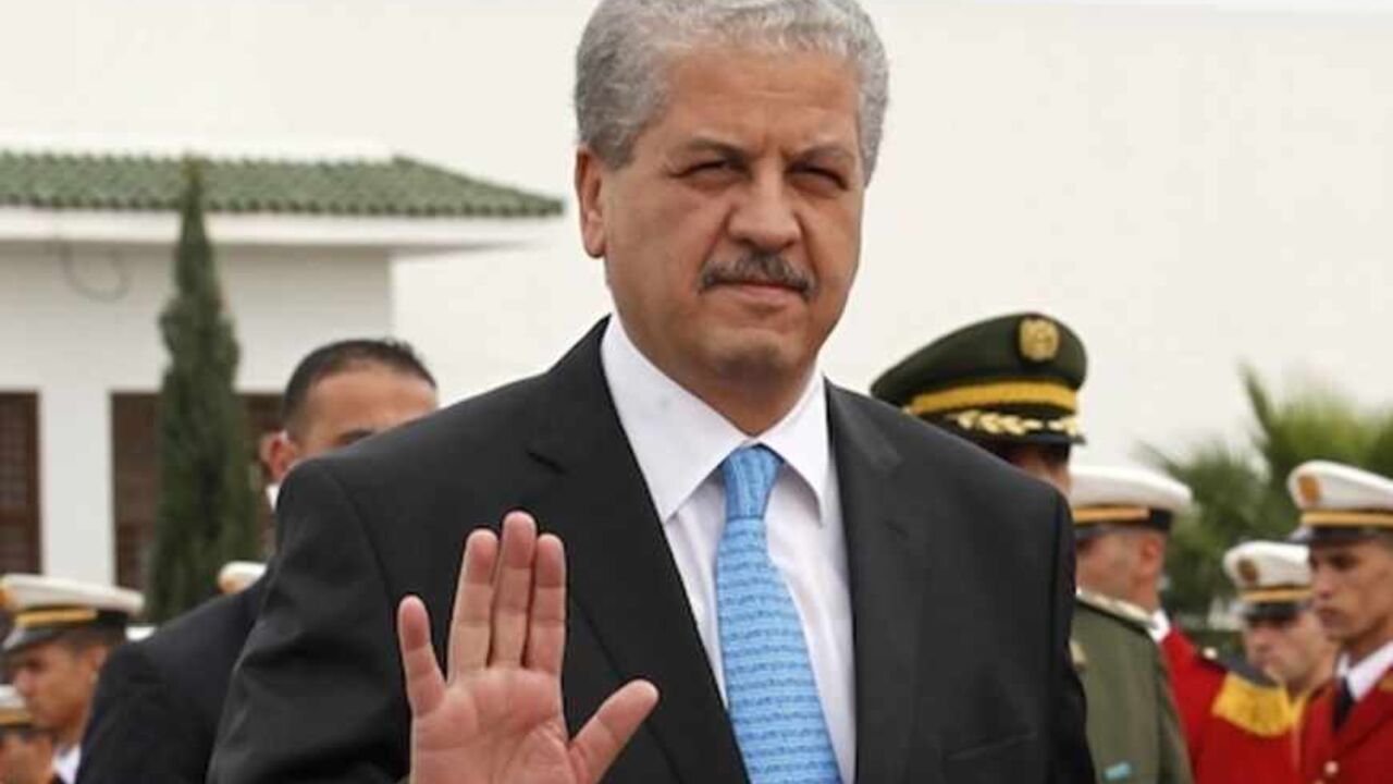 Algeria's Prime Minister Abdelmalek Sellal waves during a welcoming ceremony with Italy's Prime Minister Mario Monti in Algiers Algeria's Prime Minister Abdelmalek Sellal waves during a welcoming ceremony with Italy's Prime Minister Mario Monti (not pictured) at Houari Boumediene Airport in Algiers November 14, 2012. Picture taken November 14, 2012. REUTERS/Louafi Larbi (ALGERIA - Tags: POLITICS) - RTR3DHZF