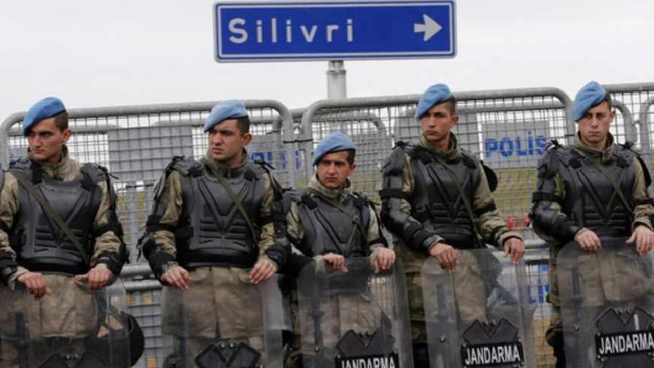 Turkish gendarmes stand guard outside the courthouse in Silivri near Istanbul Turkish gendarmes stand guard outside the courthouse in Silivri near Istanbul March 11, 2013. The trial of nearly 300 people, who are charged with attempting to overthrow Prime Minister Tayyip Erdogan's Islamist-rooted government, resumed at Silivri prison complex. The case is emblematic of Erdogan's long-standing battle with secularist opponents, and one of a series of conspiracy trials that he describes as a struggle against anti-democratic forces. REUTERS/Murad Sezer (TURKEY - Tags: MILITARY POLITICS CIV