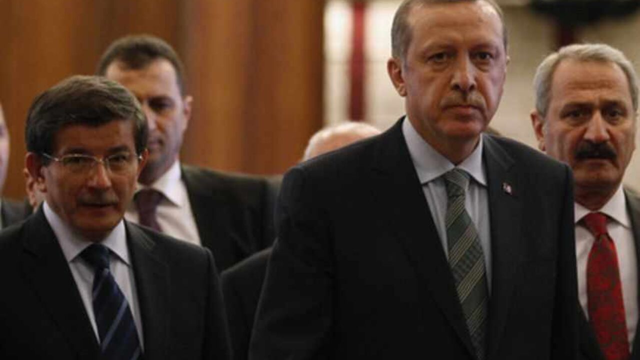 Turkey's PM Erdogan arrives for news conference as he is flanked by Foreign Minister Davutoglu, Economy Minister Caglayan and officials Esenboga Airport Turkey's Prime Minister Recep Tayyip Erdogan arrives for a news conference as he is flanked by Foreign Minister Ahmet Davutoglu (L), Economy Minister Zafer Caglayan (R) and officials before his flight to Denmark for an official visit at Esenboga Airport in Ankara March 19, 2013. REUTERS/Umit Bektas (TURKEY - Tags: POLITICS) - RTR3F72Z