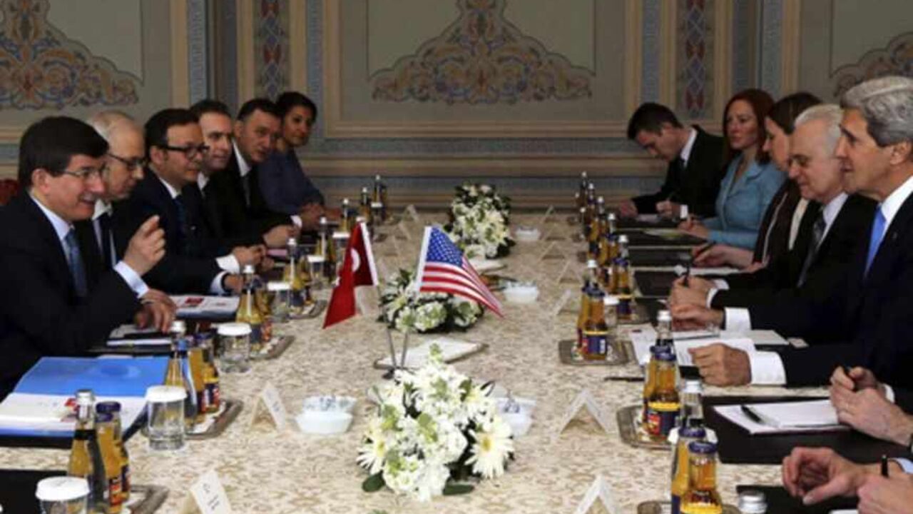 U.S. Secretary of State Kerry meets with Turkey's Foreign Minister Davutoglu in Istanbul U.S. Secretary of State John Kerry (2nd R) meets with Turkey's Foreign Minister Ahmet Davutoglu (L) at Ciragan Palace in Istanbul April 7, 2013. Kerry said on Sunday it was not up to Washington to set a deadline for Turkey and Israel to normalise ties but stressed the importance of restoring a full relationship between the two. REUTERS/Hakan Goktepe/Pool (TURKEY - Tags: POLITICS) - RTXYBQO