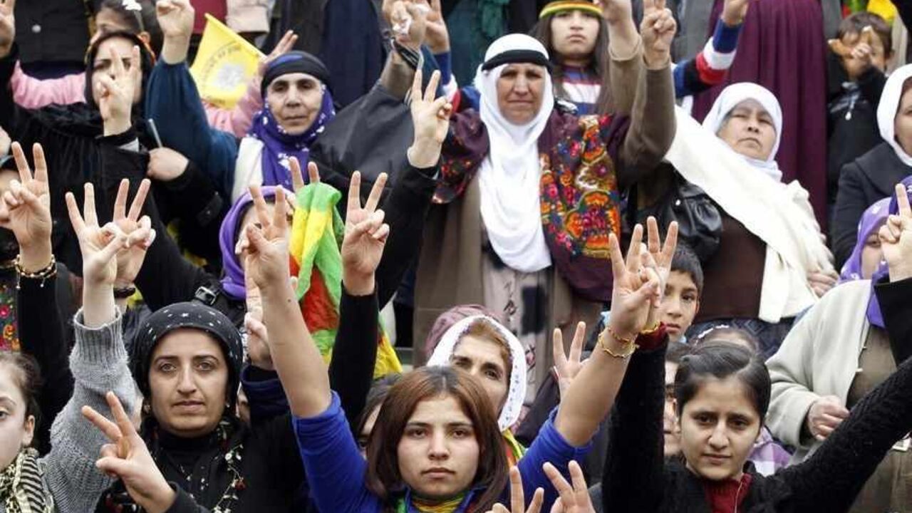 SYRIA-CRISIS/ Pro-Kurdish BDP party supporters attend a rally in support of Syrian Kurds in Viransehir February 3, 2013. REUTERS/Osman Orsal (TURKEY - Tags: POLITICS CONFLICT CIVIL UNREST) - RTR3DAO0