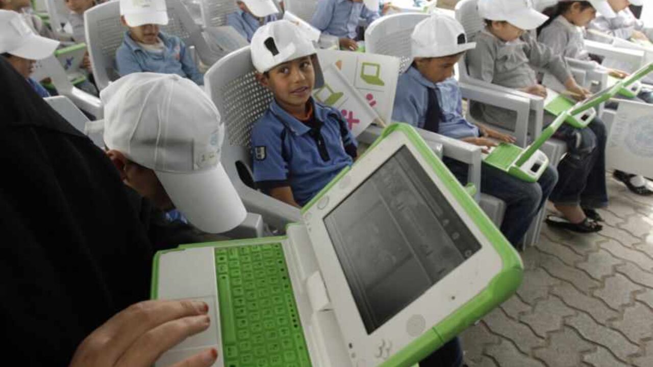 A teacher shows Palestinian students how to use new laptops at a United Nations school in Rafah refugee camp A teacher shows Palestinian students how to use new laptops at a United Nations school in Rafah refugee camp in the southern Gaza Strip April 29, 2010. The United Nations Relief and Works Agency (UNRWA) launched a campaign to distribute some 200,000 laptops to UNRWA students in the Gaza Strip, an UNRWA official said. REUTERS/Ibraheem Abu Mustafa (GAZA - Tags: POLITICS EDUCATION) - RTR2D9BM