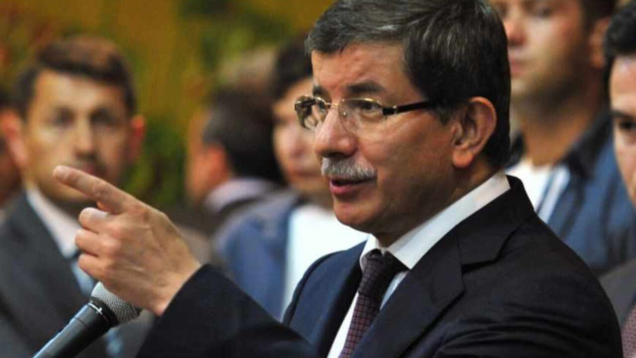 Turkish Foreign Minister Ahmet Davutoglu speaks during a news conference in the rebel stronghold of Benghazi Turkish Foreign Minister Ahmet Davutoglu speaks during a news conference in the rebel stronghold of Benghazi July 3, 2011. Turkey pledged $200 million in aid for Libya's rebel Transitional National Council and said it was time for leader Muammar Gaddafi to leave Libya. REUTERS/Esam Al-Fetori (LIBYA - Tags: POLITICS) - RTR2OFV1