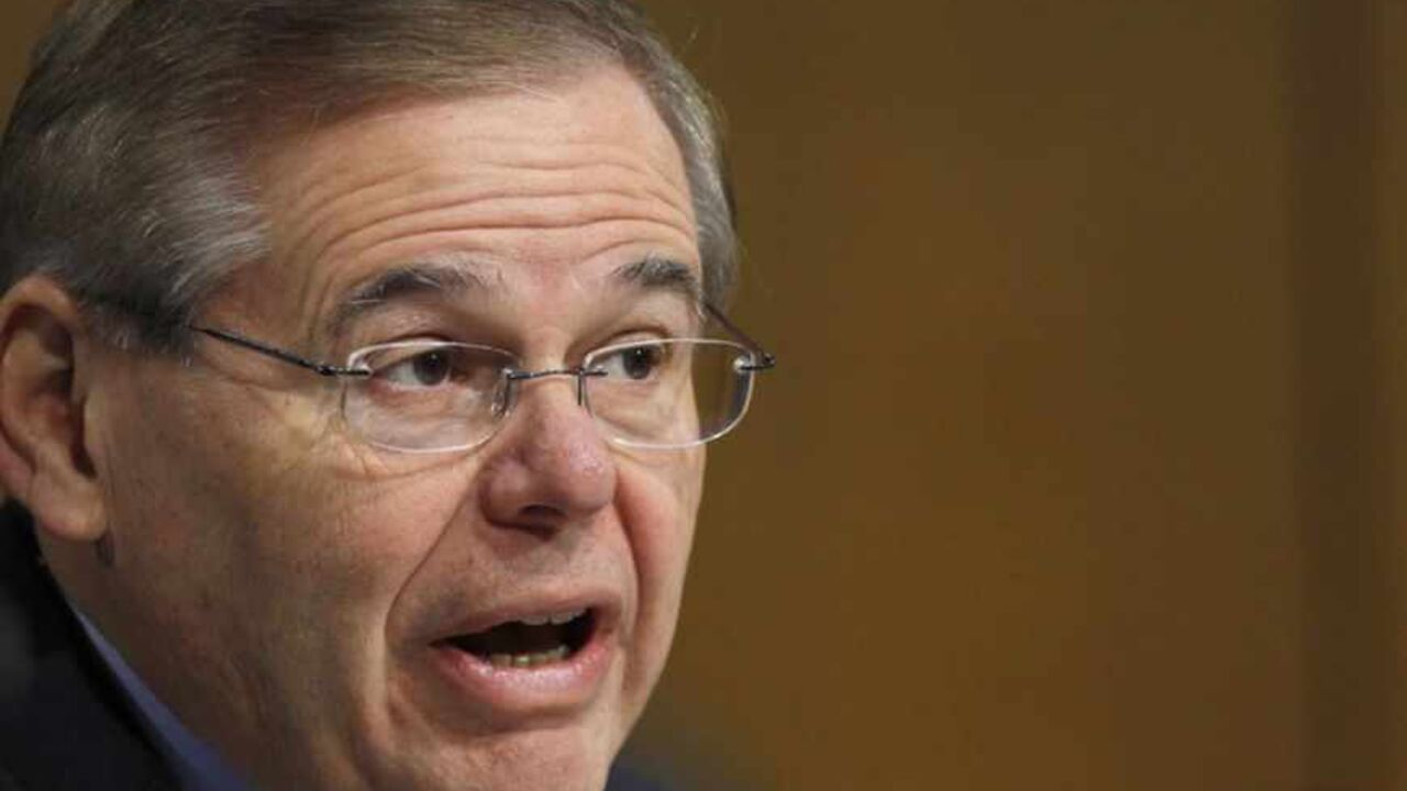 U.S. Senator Menendez listens during Senate Banking hearing in Washington U.S. Senator Bob Menendez (D-NJ) listens during Federal Reserve Board Chairman Ben Bernanke's appearance before a committee hearing on "The Semiannual Monetary Policy Report to the Congress." in Washington February 26, 2013. REUTERS/Gary Cameron (UNITED STATES - Tags: POLITICS BUSINESS HEADSHOT) - RTR3EBD8