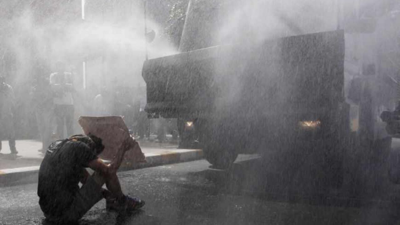 Turkish riot police use water cannon to disperse demonstrators during a protest against the destruction of trees in a park brought about by a pedestrian project, in Taksim Square in central Turkish riot police use water cannon to disperse demonstrators during a protest against the destruction of trees in a park brought about by a pedestrian project, in Taksim Square in central Istanbul May 31, 2013. REUTERS/Osman Orsal (TURKEY - Tags: POLITICS CIVIL UNREST ENVIRONMENT CRIME LAW TPX IMAGES OF THE DAY) - RTX106X6