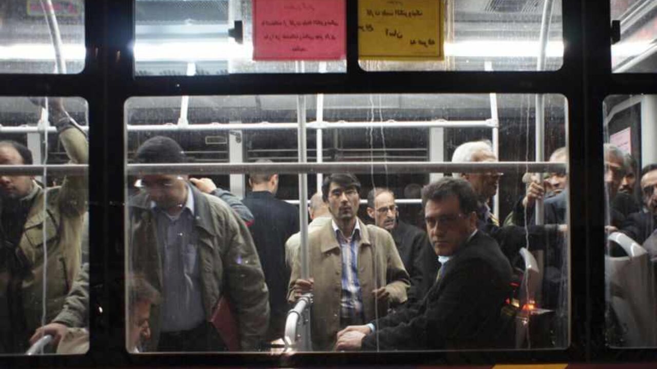 To go with Analysis IRAN-POLITICS/SUBSIDIES EDITORS' NOTE: Reuters and other foreign media are subject to Iranian restrictions on their ability to film or take pictures in Tehran.
An Iranian man looks on as he sits on a bus in Tehran December 22, 2010. With Iranians feeling choked by foreign sanctions, broken promises and money worries, President Mahmoud Ahmadinejad faces as much pressure on the economic front as from politics. Ahmadinejad has cut fuel and food subsidies to save $100 billion on the state budget and to make Iran less vulnerable to an