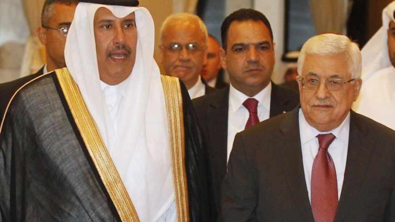 Palestinian President Abbas and Qatar's PM Thani arrive at a meeting of the Arab Peace Initiative Committee in Doha Palestinian President Mahmoud Abbas (front R) and Qatar's Prime Minister Hamad bin Jassim bin Jabr Al-Thani arrive at a meeting of the Arab Peace Initiative Committee in Doha April 8, 2013. REUTERS/Mohammed Dabbous (QATAR - Tags: POLITICS) - RTXYDPI