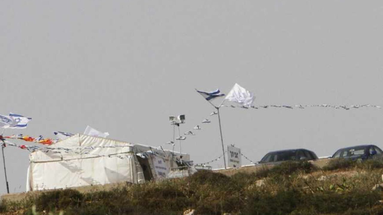 Eviatar, a new makeshift settlement named after the Israeli settler killed by Palestinian in the occupied West Bank on Tuesday, is seen on a hilltop near Nablus Eviatar, a new makeshift settlement named after Eviatar Borovsky, the Israeli settler killed by Palestinian Salam Zaghal in the occupied West Bank on Tuesday, is seen on a hilltop about 1km from the fatal attack, near the West Bank city of Nablus May 2, 2013. While the family of the dead settler mourned their loss, the Zaghal family, living in poverty in the north of the Palestinian territory, defended Salam's action as justified. REUTERS/Abed Omar Qusini (WEST BANK - Tags: POLITICS CIVIL UNREST) - RTXZ7L1