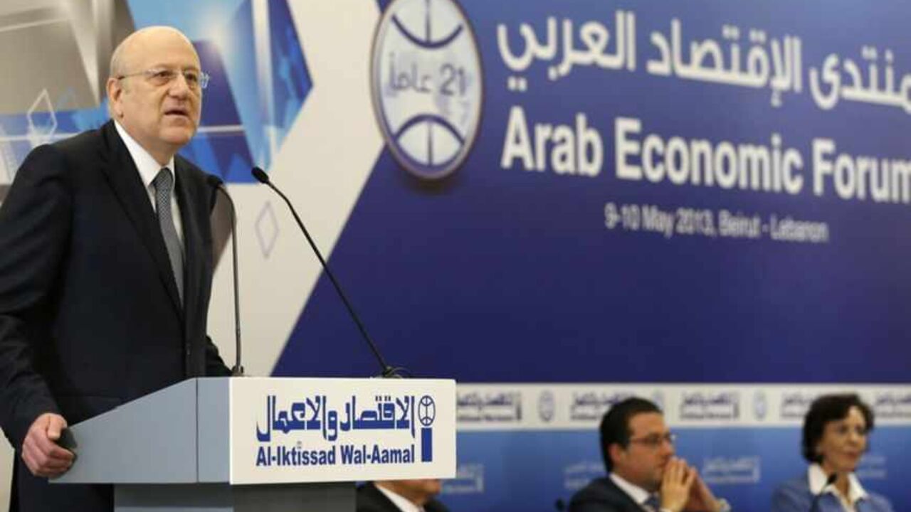 Lebanon's caretaker Prime Minister Najib Mikati speaks during the opening of the Arab Economic Forum 2013 at a hotel in Beirut Lebanon's caretaker Prime Minister Najib Mikati speaks during the opening of the Arab Economic Forum 2013 at a hotel in Beirut May 9, 2013. REUTERS/Mohamed Azakir (LEBANON - Tags: BUSINESS POLITICS) - RTXZG0A