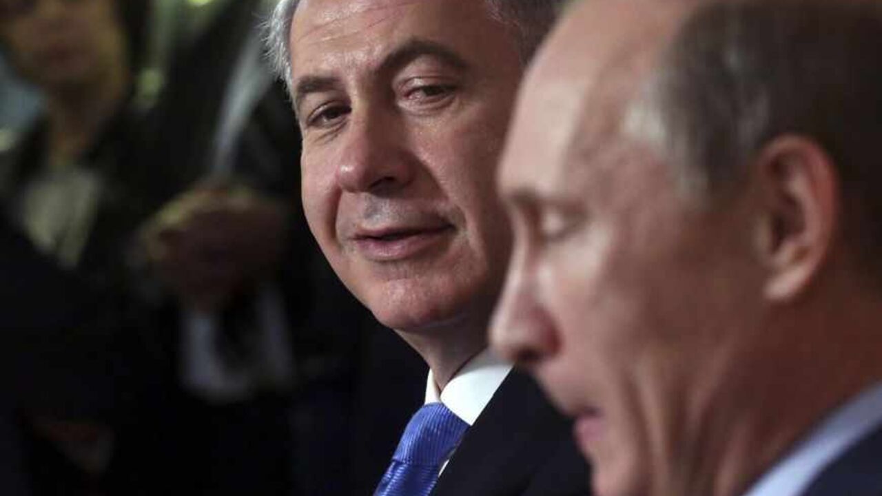 Russian President Vladimir Putin and Israeli Prime Minister Benjamin Netanyahu attend a news conference at the Bocharov Ruchei state residence in the Black Sea resort of Sochi Russian President Vladimir Putin (R) and Israeli Prime Minister Benjamin Netanyahu attend a news conference at the Bocharov Ruchei state residence in the Black Sea resort of Sochi, May 14, 2013. Putin said on Tuesday it was important to avoid actions that might aggravate Syria's civil war, a veiled warning against foreign military intervention or arming anti-government forces. REUTERS/Maxim Shipenkov/Pool (RUSSIA - Tags: POLITICS) - RTXZLY6