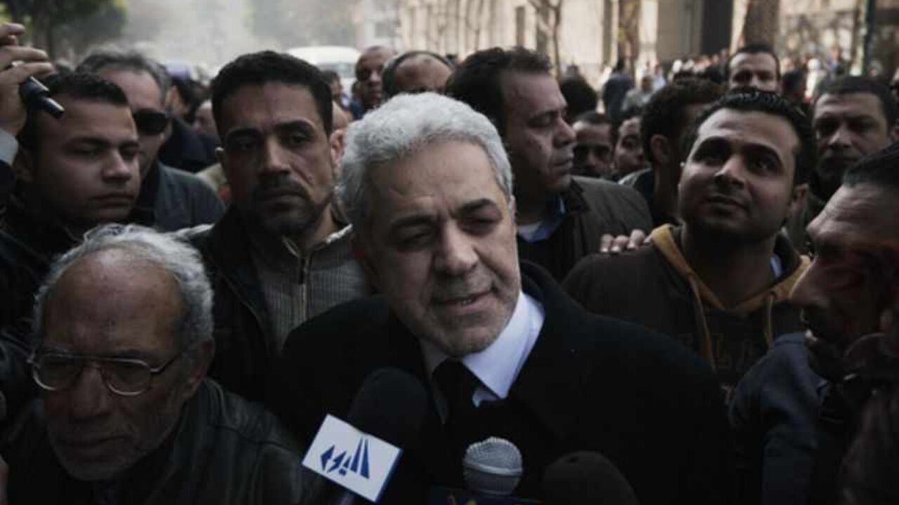 EGYPT-POLITICS-UNREST-FUNERAL Former Egyptian president candidate Hamdeen Sabahi (C) talks to the media after attending the funeral of killed Egyptian activists Amro Saad and Mohammed al-Guindi outside Omar Makram Mosque in Cairo's Tahrir Square on February 4, 2013. Saad died in clashes during anti-government protests on February 1, while Guindi, 28, went missing last month after joining protests demanding change on the second anniversary of Egypt's uprising against former president Hosni Mubarak and then slipped into a coma following d