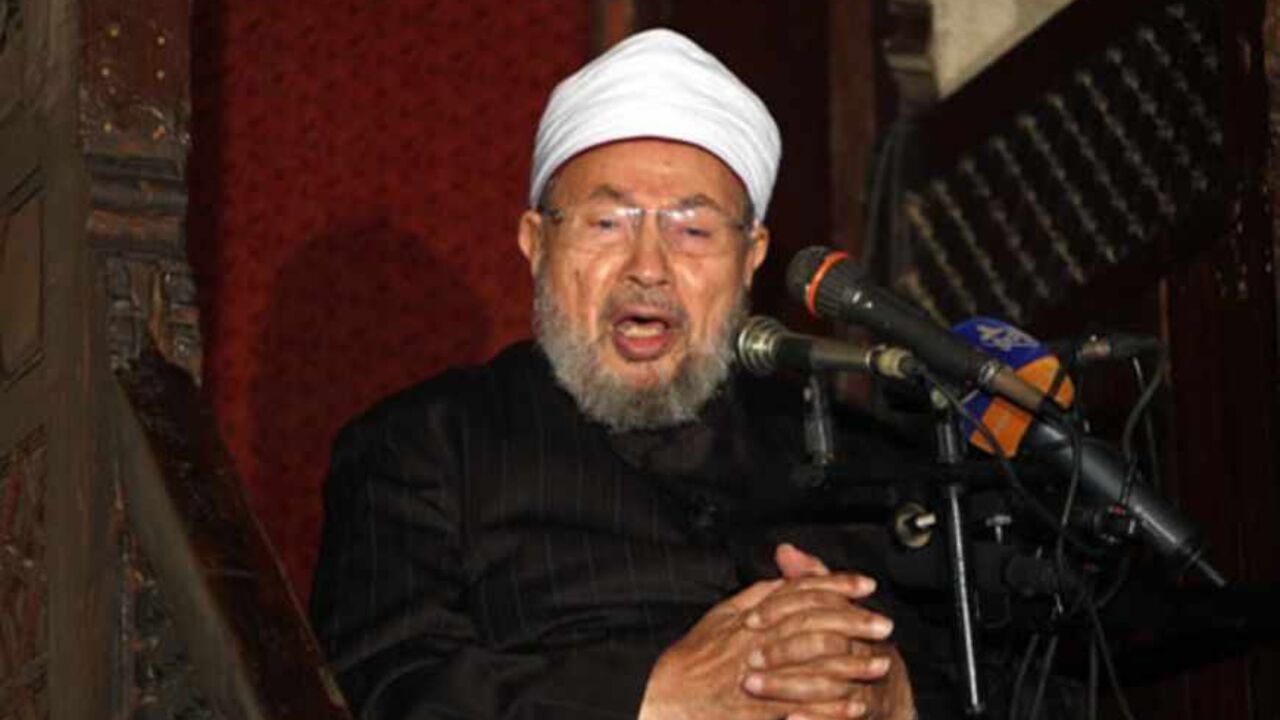 Nic6169668 Egyptian Muslim scholar Sheikh Yusuf al-Qaradawi addresses Muslims at Al-Azhar mosque during the weekly Friday prayer in Cairo on December 28, 2012. People demonstrated outside the Al-Azhar mosque in support of the Syrian people and against Syria's President Bashar al-Assad. AFP PHOTO/MAHMUD HAMS (Photo credit should read MAHMUD HAMS/AFP/Getty Images)