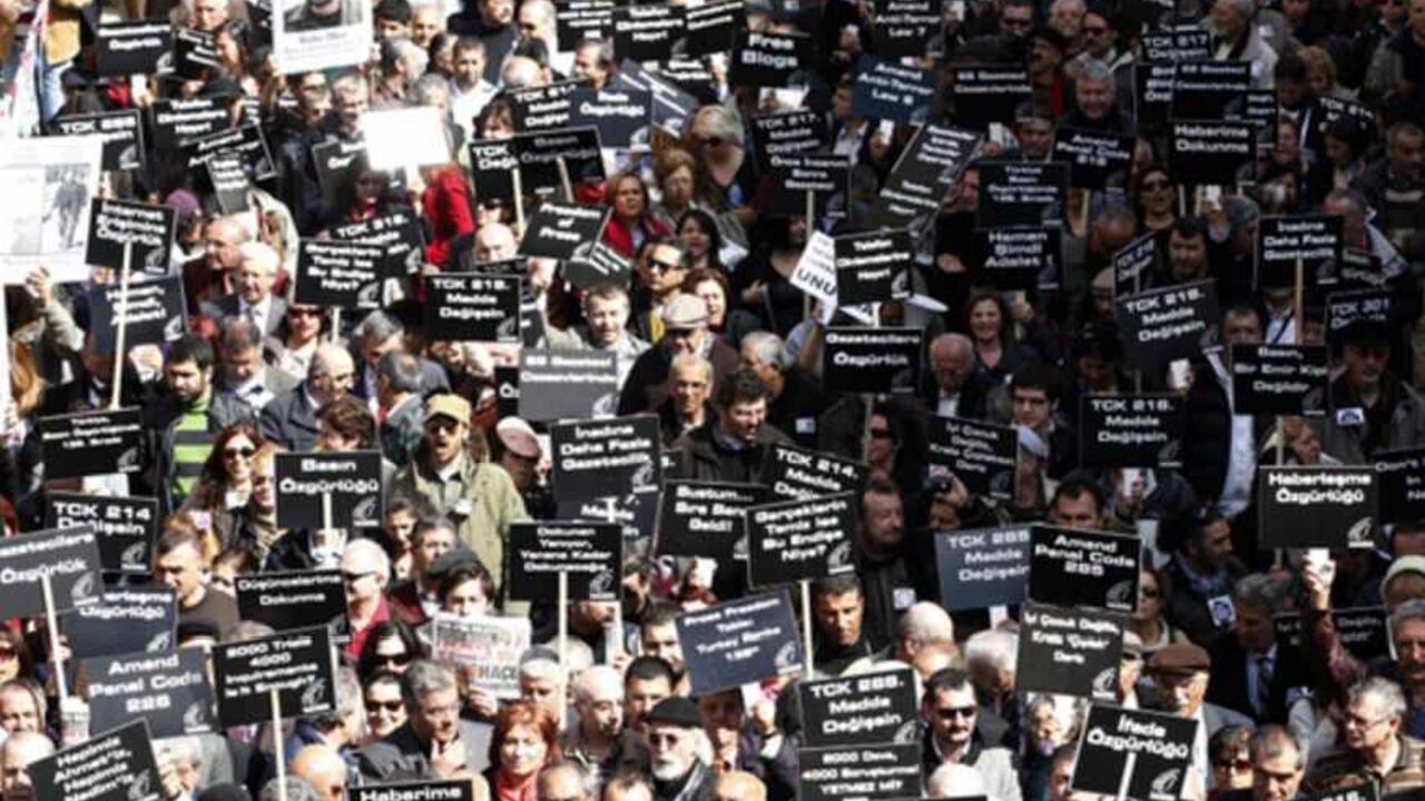 Journalists and activists participate in a rally calling for press freedom in central Ankara Journalists and activists participate in a rally calling for press freedom in central Ankara March 19, 2011. The recent arrest and jailing of some 10 journalists as part of investigations into Ergenekon, an ultra-nationalist, secularist network opposed to Prime Minister's Tayyip Erdogan's rule, has a triggered expressions of concern from the European Union, the U.S. and human rights groups about Ankara's commitment to media freedom and democratic principles. REUTERS/Umit Bektas (TURKEY - Tags: CIVIL UNREST