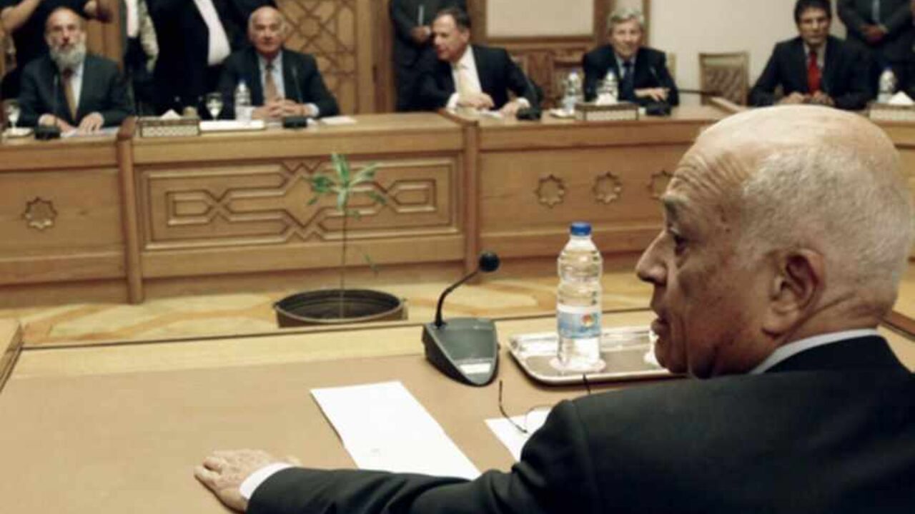 Egypt's Foreign Minister Nabil Elaraby attends during meeting with with Former chief of Israel's Shin Bet intelligence agency Jacob Perry front (L) and other members of a delegation from the "Israeli Peace Initiative" group lobbying its government to c Egypt's Foreign Minister Nabil Elaraby (R) attends a meeting with former chief of Israel's Shin Bet intelligence agency Jacob Perry and the delegation from "Israeli Peace Initiative" group, lobbying its government to concede land to Palestinians for peace, in Cairo May 19, 2011. REUTERS/Mohamed Abd El-Ghany (EGYPT - Tags: POLITICS CIVIL UNREST) - RTR2MMIG