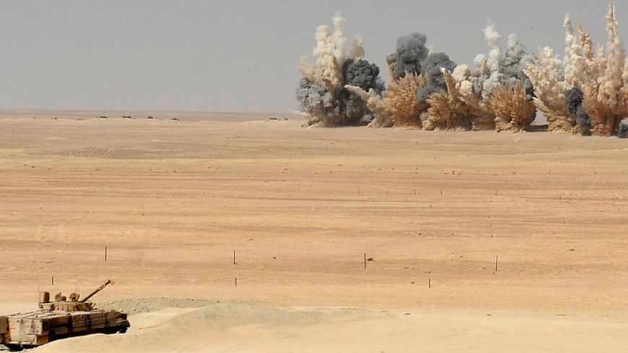 Smoke is seen after UAE F-16 fighter jets fired missiles during joint military manoeuvres with the French army in the desert of Abu Dhabi Smoke is seen after United Arab Emirates F-16 fighter jets fired missiles during joint military manoeuvres with the French army in the desert of Abu Dhabi May 2, 2012. REUTERS/Ben Job (UNITED ARAB EMIRATES - Tags: MILITARY POLITICS TPX IMAGES OF THE DAY) FOR BEST QUALITY IMAGE SEE: GM1E85G1LE201 - RTR31I22