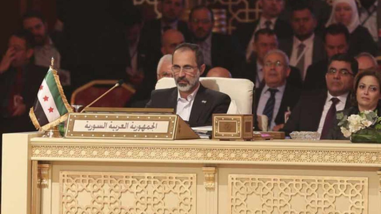Moaz Alkhatib, head of the Syrian National Coalition, attends the Arab League summit in Doha Moaz Alkhatib, head of the Syrian National Coalition, attends the Arab League summit in Doha in this March 26, 2013 handout. A summit of Arab heads of state opened in the Qatari capital Doha on Tuesday expected to focus on the war in Syria as well as on the Israeli-Palestinian conflict. REUTERS/Handout (QATAR - Tags: POLITICS) ATTENTION EDITORS - FOR EDITORIAL USE ONLY. NOT FOR SALE FOR MARKETING OR ADVERTISING CAMPAIGNS. THIS IMAGE HAS BEEN SUPPLIED BY A THIRD PARTY. IT IS DISTRIBUTED, EXACTLY AS RECEIVED