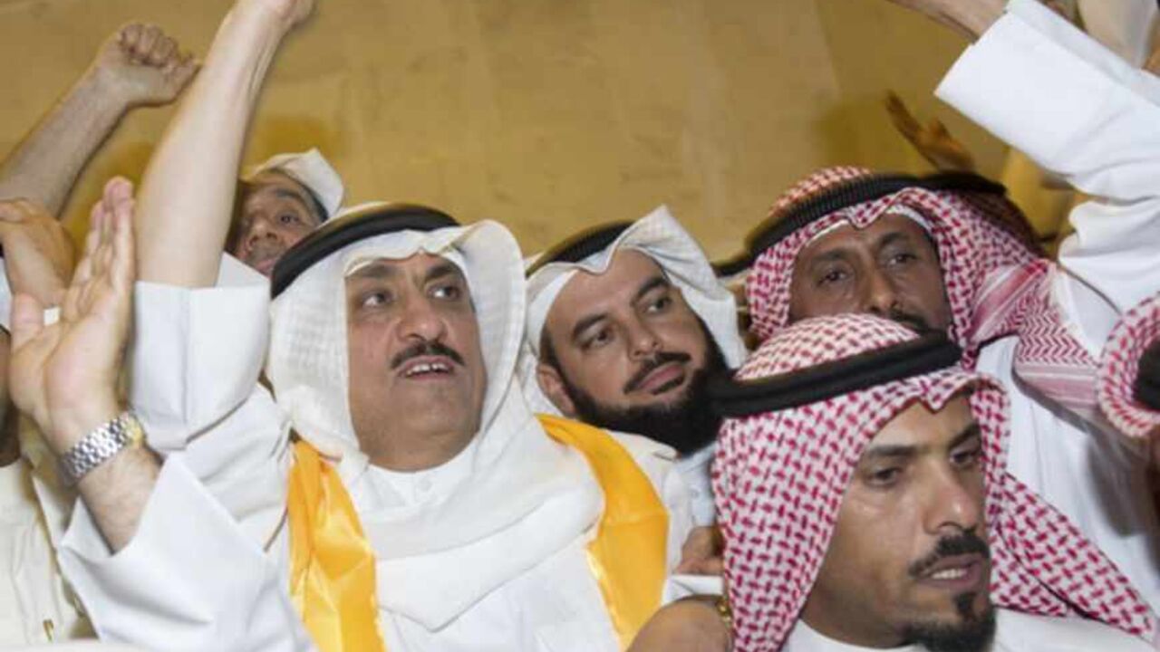 Kuwaiti former member of parliament and opposition politician Barrak greets supporters from his house in Andulos, after a ruling sentenced him to jail for insulting the emir Kuwaiti former member of parliament and opposition politician Musallam al-Barrak (L) greets supporters from his house in Andulos, after a ruling sentenced him to jail for insulting the emir, April 15, 2013. Barrak was sentenced to five years in jail on Monday for insulting the emir, his lawyer said, in a ruling that brought thousands of people to the streets in protest. The Kuwaiti criminal court found Barrak guilty of insulting Sheikh Sabah al-Ahmad al-Sabah in a speech in October last year in which he app