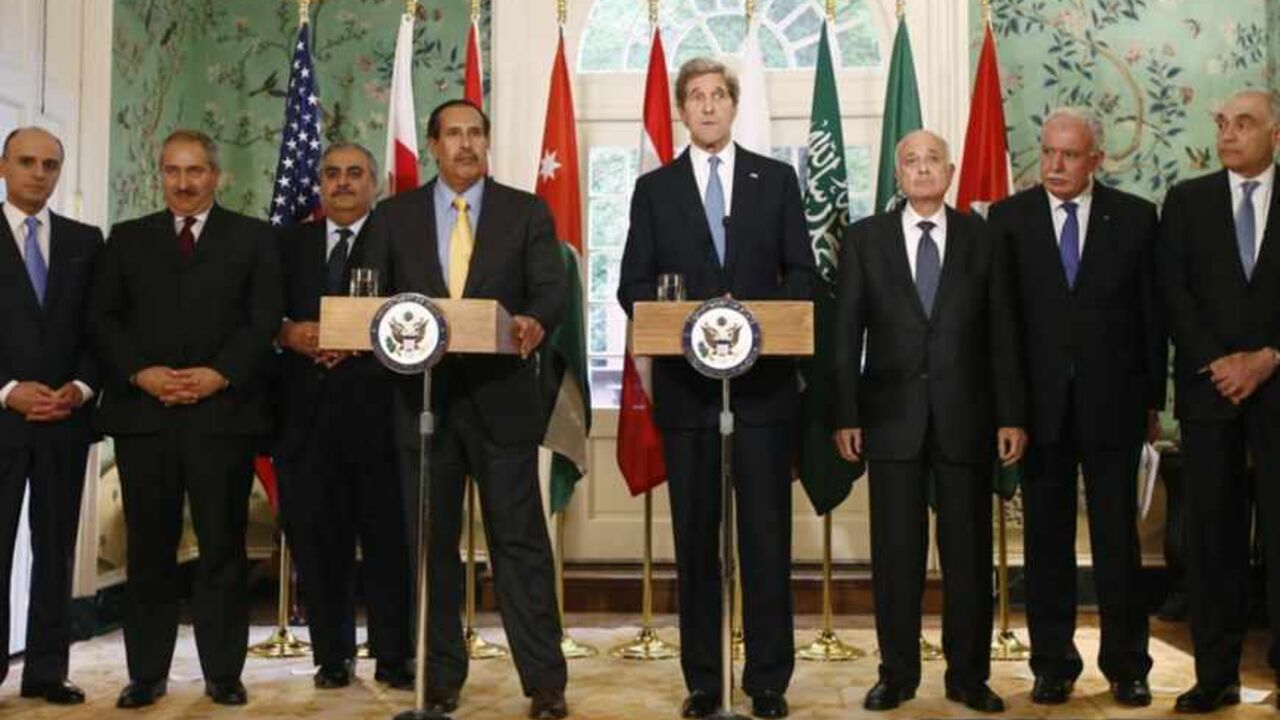 U.S. Secretary of State John Kerry and Qatar's Prime Minister Sheikh Hamad bin Jassim al-Thani speak after a meeting with members of the Arab League in Washington U.S. Secretary of State John Kerry (4th R) and Qatar's Prime Minister Sheikh Hamad bin Jassim al-Thani (4th L) speak to the media following a meeting with members of the Arab League at Blair House in Washington April 29, 2013. With them are (L-R) Saudi Ambassador to the United States Adel A-Jubeir, Jordan's Foreign Minister Nasser Judeh, Bahrain's Foreign Minister Sheikh Khalid bin Ahmed al Khalifa, Arab League Secretary General Nabil al-Araby, Palestinian Authority Foreign Minister Riyad al-Malki and Egypt