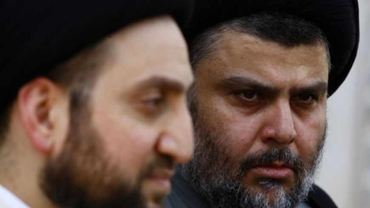 Iraqi Shi'ite cleric Moqtada al-Sadr and Ammar al-Hakim, leader of the Islamic Supreme Council of Iraq (ISCI), hold a news conference in Najaf Iraqi Shi'ite cleric Moqtada al-Sadr (R) and Ammar al-Hakim, leader of the Islamic Supreme Council of Iraq (ISCI), hold a news conference in Najaf, 160 km (100 miles) south of Baghdad, May 8, 2013. REUTERS/Haider Ala (IRAQ - Tags: POLITICS) - RTXZEUT