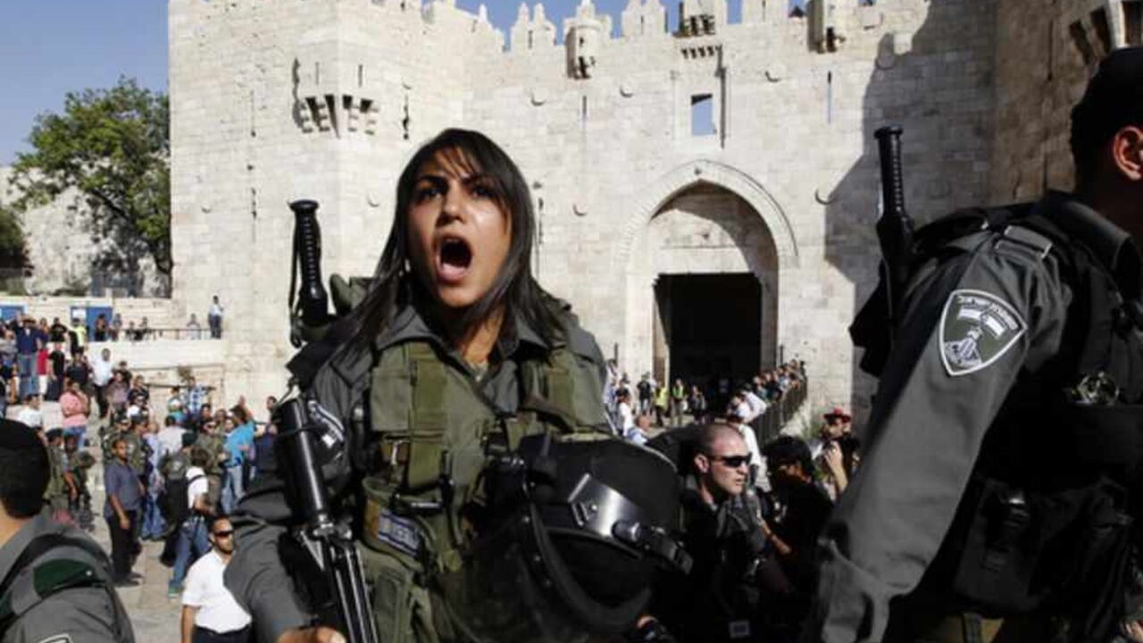Israeli border police officers guard the front of Damascus Gate outside Jerusalem's Old City during a parade marking Jerusalem Day Israeli border police officers guard the front of Damascus Gate outside Jerusalem's Old City during a parade marking Jerusalem Day May 8, 2013. Jerusalem Day marks the anniversary of Israel's capture of the Eastern part of the city during the 1967 Middle East War. In 1980, Israel's parliament passed a law declaring united Jerusalem as the national capital, a move never recognised internationally. There were confrontations on Wednesday between Muslims and Jews outside Jerusalem's walled Old City, where al-Aq