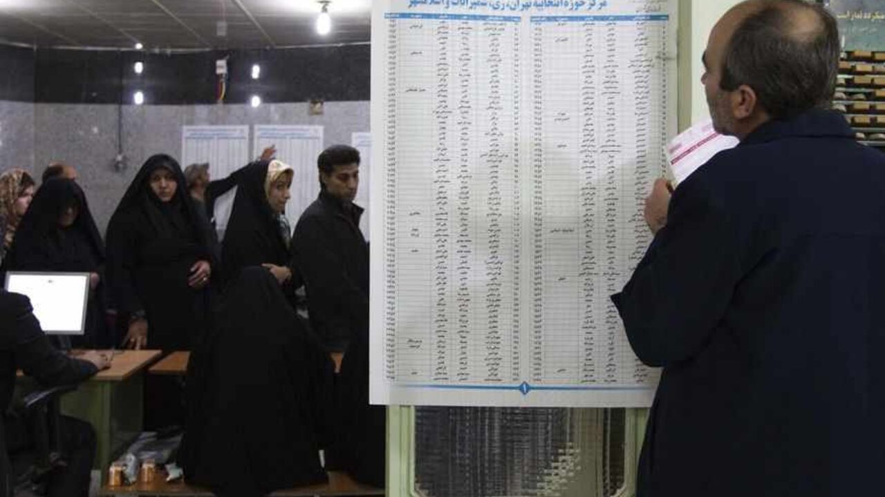 IRAN-ELECTION/ EDITORS' NOTE: Reuters and other foreign media are subject to Iranian restrictions on leaving the office to report, film or take pictures in Tehran.
A man fills in his ballot during Iran's parliamentary election at a mosque in southern Tehran March 2, 2012. Iranians voted on Friday in a parliamentary election likely to reinforce Supreme Leader Ayatollah Ali Khamenei's power over rival hardliners led by President Mahmoud Ahmadinejad. REUTERS/Raheb Homavandi (IRAN - Tags: POLITICS ELECTIONS) - RTR2YQMD