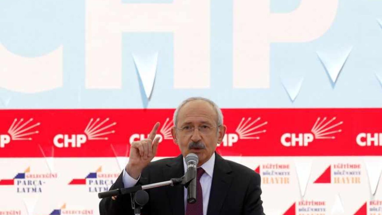Turkey's main opposition Republican People's Party leader Kemal Kilicdaroglu addresses his supporters during a demonstration in Ankara Turkey's main opposition Republican People's Party (CHP) leader Kemal Kilicdaroglu addresses his supporters during a demonstration in Ankara March 27, 2012. Thousands of Turkish opposition supporters demonstrated in the capital Ankara on Tuesday against a government attempt to railroad a new education bill through parliament which secular parties say is designed to promote Islamic schooling. The government wants to overturn a 1997 law imposed with the backing of the military which led to a sharp decrease in