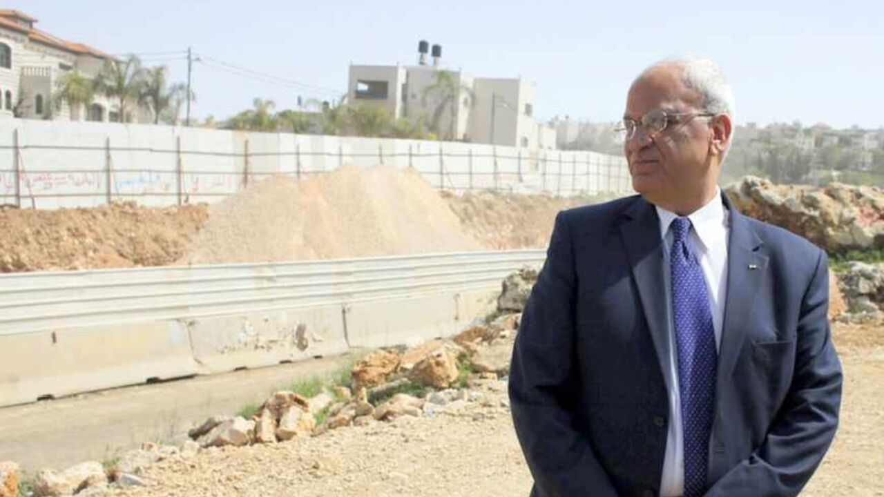 Saeb Erekat, a Palestinian senior politician and chief negotiator stands near a road under construction, which has become the latest focal point of Arab-Israeli discontent, in the Arab neighbourhood of Beit Safafa in Jerusalem March 14, 2013. Israel's Prime Minister Benjamin Netanyahu clinched deals for a coalition government on Thursday reflecting a shift to the centre in Israel and a domestic agenda that has shunted peacemaking with Palestinians to the sidelines. "We hope that this Israeli government will