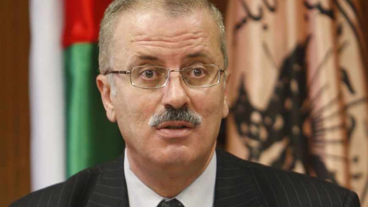 File photo of Rami Hamdallah speaking at the university in Nablus Rami Hamdallah, president of al-Najah National University, speaks during a meeting at the university in the West Bank city of Nablus February 14, 2010. Palestinian President Mahmoud Abbas named British-educated political independent Hamdallah as new prime minister on June 2, 2013, a move that was immediately condemned by Gaza Strip rulers Hamas. Picture taken February 14, 2010. REUTERS/Abed Omar Qusini (WEST BANK - Tags: POLITICS EDUCATION) - RTX109VL