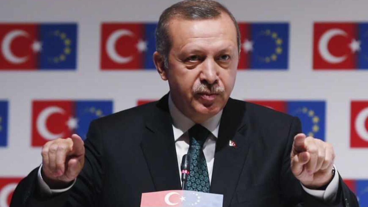Turkish PM Erdogan gestures during the Ministry for European Union Affairs' EU-Istanbul Conference in Istanbul Turkish Prime Minister Tayyip Erdogan gestures during the Ministry for European Union Affairs' EU-Istanbul Conference in Istanbul June 7, 2013. Erdogan called on Turks on Friday to distance themselves from lawless protests and said accusations of the excessive use of police force during days of unrest were being investigated. REUTERS/Osman Orsal (TURKEY - Tags: CIVIL UNREST POLITICS TPX IMAGES OF THE DAY) - RTX10F6W