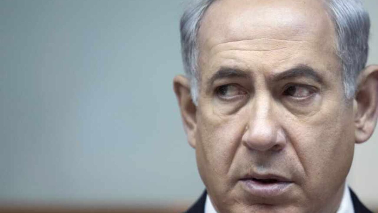 Israel's Prime Minister Netanyahu attends the weekly cabinet meeting in Jerusalem Israel's Prime Minister Benjamin Netanyahu attends the weekly cabinet meeting in Jerusalem June 9, 2013. Israel aims to stay out of Syria's civil war, Netanyahu said on Sunday, signalling restraint despite violence eroding security at the Golan Heights border area. REUTERS/Abir Sultan/Pool (JERUSALEM - Tags: POLITICS CIVIL UNREST HEADSHOT) - RTX10H62