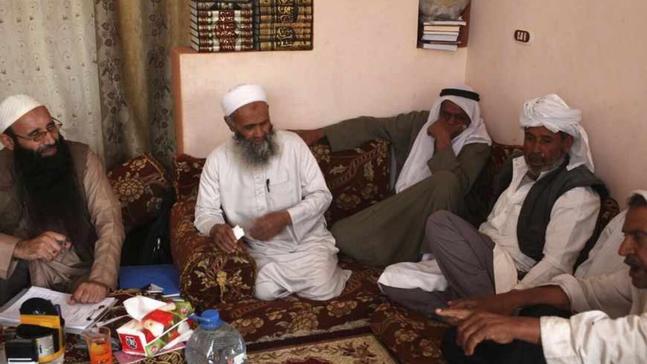 Bedouin tribesmen attend tribal council tribunal, where Islamic Sharia laws are used to resolve disputes between tribes, in Sheikh Zowyyed Bedouin tribesmen attend a tribal council tribunal, where Islamic Sharia laws, instead of tribal customary ones which were commonly used before, are used to resolve disputes between tribes, in Sheikh Zowyyed city, North Sinai, May 13, 2013. REUTERS/Asmaa Waguih (EGYPT - Tags: RELIGION POLITICS SOCIETY) - RTXZLE6