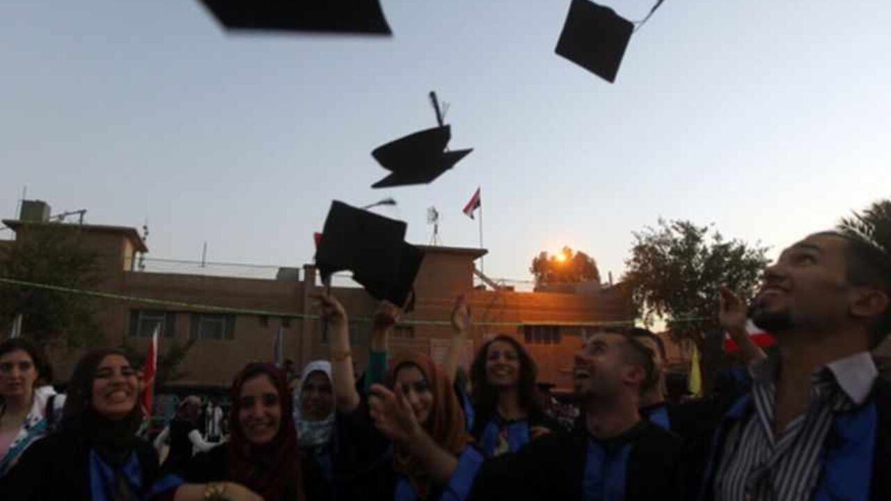 Iraqi students throw their hats duriing Iraqi students throw their hats duriing their graduation ceremony at Technical University of Baghdad on June 30, 2012 to celebrate receiving their degrees for the first time since the US-led war on Iraq in 2003. The ceremonies were officially stopped by authorities due to the security issues after several attacks and explosions took place at the university since the ousting of former president, Saddam Hussein in 2003. AFP PHOTO/AHMAD AL-RUBAYE (Photo credit should read AHMAD AL-RUBAYE/AFP/GettyImages