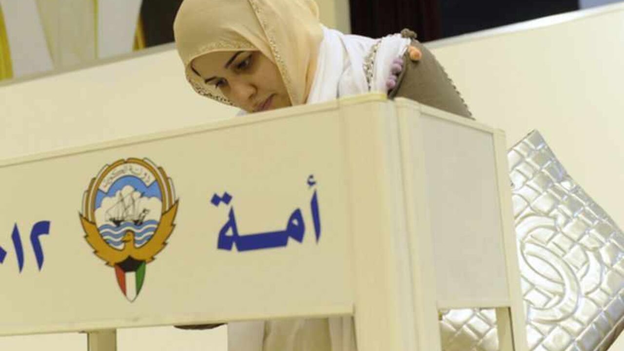 A woman votes at a polling station in Kuwait city A woman votes at a polling station in Kuwait city February 2, 2012. Kuwaitis headed to the polls on Thursday for the fourth time in six years in a snap parliamentary election in which opposition candidates expect to expand their influence and push for change in the oil-exporting Gulf Arab state. REUTERS/Stringer (KUWAIT - Tags: POLITICS ELECTIONS) - RTR2X7TI