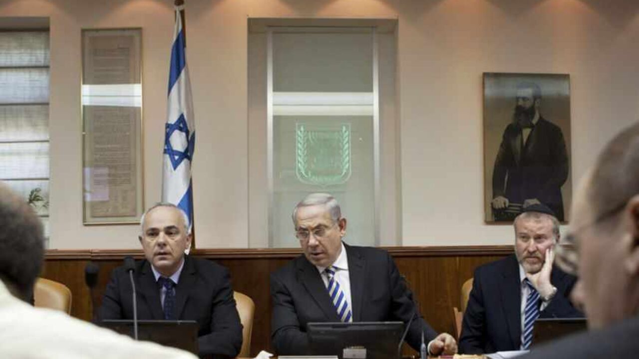 Israel's PM Netanyahu attends cabinet meeting in Jerusalem Israel's Prime Minister Benjamin Netanyahu (C) attends the weekly cabinet meeting in Jerusalem June 2, 2013. REUTERS/Sebastian Scheiner/Pool (JERUSALEM - Tags: POLITICS) - RTX108VX