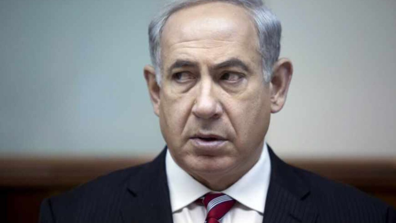 Israel's Prime Minister Netanyahu attends the weekly cabinet meeting in Jerusalem Israel's Prime Minister Benjamin Netanyahu attends the weekly cabinet meeting in Jerusalem June 9, 2013. Israel aims to stay out of Syria's civil war, Netanyahu said on Sunday, signalling restraint despite violence eroding security at the Golan Heights border area. REUTERS/Abir Sultan/Pool (JERUSALEM - Tags: POLITICS CIVIL UNREST HEADSHOT) - RTX10H62