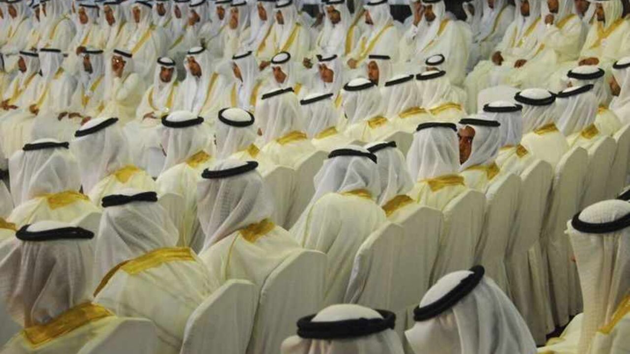 Grooms take part in a mass wedding ceremony in Tabuk Grooms take part in a mass wedding ceremony in Tabuk, 1500 km (932 miles) from Riyadh, May 2, 2012. Governor of Tabuk Prince Fahad Bin Sultan bin Abdul-Aziz and a local group organised the mass wedding for about 1600 couples to help youths who are unable to afford expensive ceremonies because of the rising cost of living. REUTERS/Mohamed Alhwaity (SAUDI ARABIA - Tags: SOCIETY) - RTR31J6Q