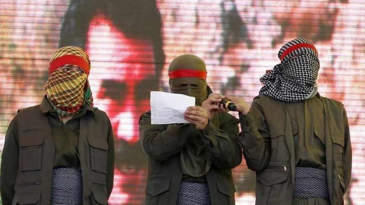 Masked supporters of jailed Kurdish rebel leader Abdullah Ocalan stand on the stage as one reads a statement during a gathering to celebrate Newroz in the southeastern Turkish city of Diyarbakir Masked supporters of jailed Kurdish rebel leader Abdullah Ocalan stand on the stage as one reads a statement during a gathering to celebrate Newroz in the southeastern Turkish city of Diyarbakir March 21, 2013. Jailed Kurdish rebel leader Abdullah Ocalan ordered his fighters on Thursday to cease fire and withdraw from Turkish soil as a step to ending a conflict that has killed 40,000 people, riven the country and battered its economy. Hundreds of thousands of Kurds gathered in the regional centre of Diyarb