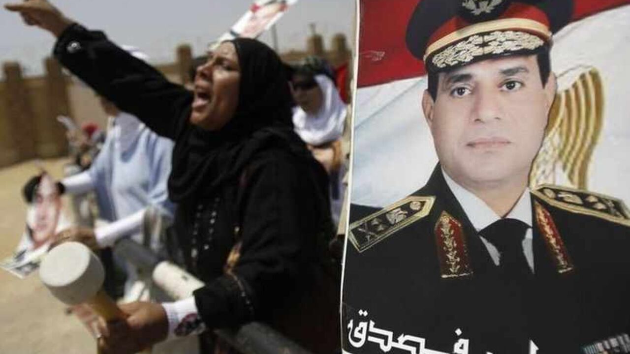 Supporters of Egypt's former President Mubarak shout slogans outside a police academy before Mubarak's trial in Cairo Supporters of Egypt's former President Hosni Mubarak shout slogans against members of the Muslim Brotherhood and supporters of ousted Egyptian President Mohamed Mursi near a poster of Egypt's armed forces chief General Abdel Fattah al-Sisi, outside a police academy before Mubarak's trial in Cairo July 6, 2013. The slow-motion retrial of former Egyptian autocrat Hosni Mubarak dragged on at snail's pace on Saturday, impervious to the latest upheaval in the country he ruled for 30 years - the military overthro