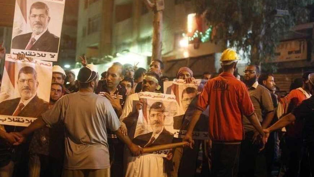 Religious scholars and Mursi supporters take part in an anti-army rally that started from their sit-in area around Raba' al-Adawya mosque, east of Cairo Religious scholars and supporters of deposed Egyptian president Mohamed Mursi take part in an anti-army rally that started from their sit-in area around Raba' al-Adawya mosque, east of Cairo, July 30, 2013. Europe's top diplomat, Catherine Ashton, shuttled between Egypt's rulers and the Muslim Brotherhood on Monday in a mission to pull the country back from more bloodshed, but both sides were unyielding after 80 Islamist supporters were gunned down. REUTERS/Asmaa Waguih (EGYPT - Tags: POLITICS CIVIL UNREST)