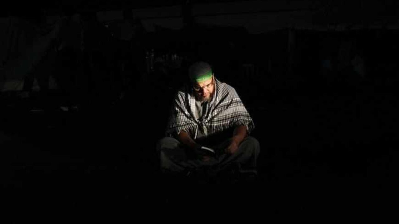 A supporter of deposed Egyptian President Mohamed Mursi reads the Koran at the Rabaa Adawiya square where Mursi's supporters are camping in Cairo A supporter of deposed Egyptian President Mohamed Mursi reads the Koran at the Rabaa Adawiya square where Mursi's supporters are camping in Cairo July 9, 2013. Egypt's interim head of state has set a speedy timetable for elections to drag the Arab world's biggest country from crisis, after the military ouster of Mursi last week sparked a wave of bloody protests. REUTERS/Khaled Abdullah (EGYPT - Tags: POLITICS CIVIL UNREST RELIGION TPX IMAGES OF THE DAY) - RTX11HD4