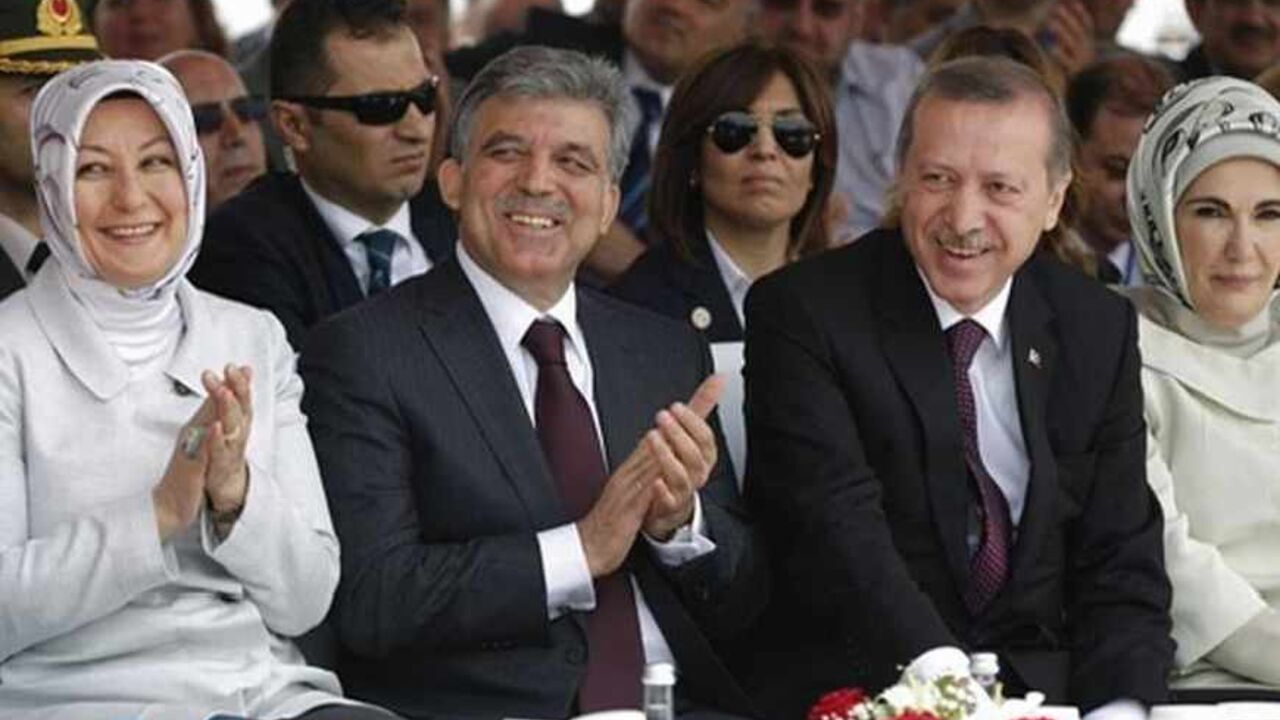 TURKEY/ Turkey's Prime Minister Tayyip Erdogan (2nd R) and President Abdullah Gul (2nd L), accompanied by their wives Emine Erdogan (R) and Hayrunnisa Gul (L), attend a groundbreaking ceremony for the third Bosphorus bridge linking the European and Asian sides of Istanbul May 29, 2013. REUTERS/Murad Sezer (TURKEY - Tags: BUSINESS CONSTRUCTION POLITICS) - RTX10515