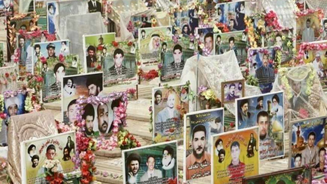 IRAQ/SADR Posters of late Shi'ite Mehdi Army members are displayed on their graves in a Sadrist cemetery in the holy city of Najaf, 160 km (100 miles) south of Baghdad September 13, 2008. Forced off Iraq streets and with diminished political clout, what anti-American Shi'ite cleric Moqtada al-Sadr and his Mehdi Army militia do next will be crucial if they are to remain relevant. Picture taken September 13, 2008. To match feature IRAQ/SADR REUTERS/Ceerwan Aziz (IRAQ) - RTX8SVI