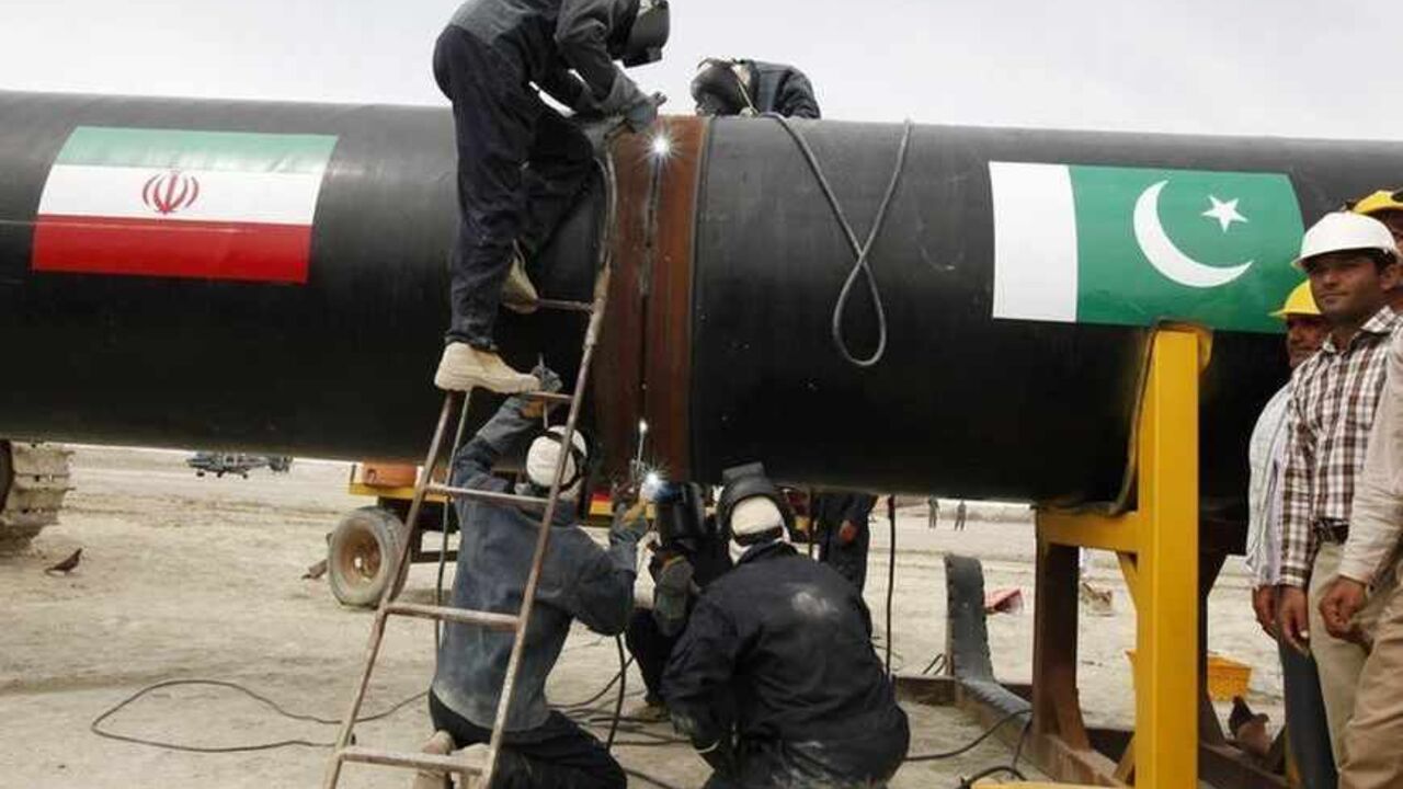 Irani workers weld the pipeline during a groundbreaking ceremony to mark the inauguration of the Iran-Pakistan gas pipeline in Chahbahar Irani workers weld the pipeline during a groundbreaking ceremony to mark the inauguration of the Iran-Pakistan gas pipeline, in the city of Chahbahar in southeastern Iran March 11, 2013. Ahmadinejad and Zardari marked the start of Pakistani construction on the much-delayed gas pipeline on Monday, Iranian media reported, despite U.S. pressure on Islamabad to back out of the project. REUTERS/Mian Khursheed (IRAN - Tags: POLITICS ENERGY BUSINESS) - RTR3EUST