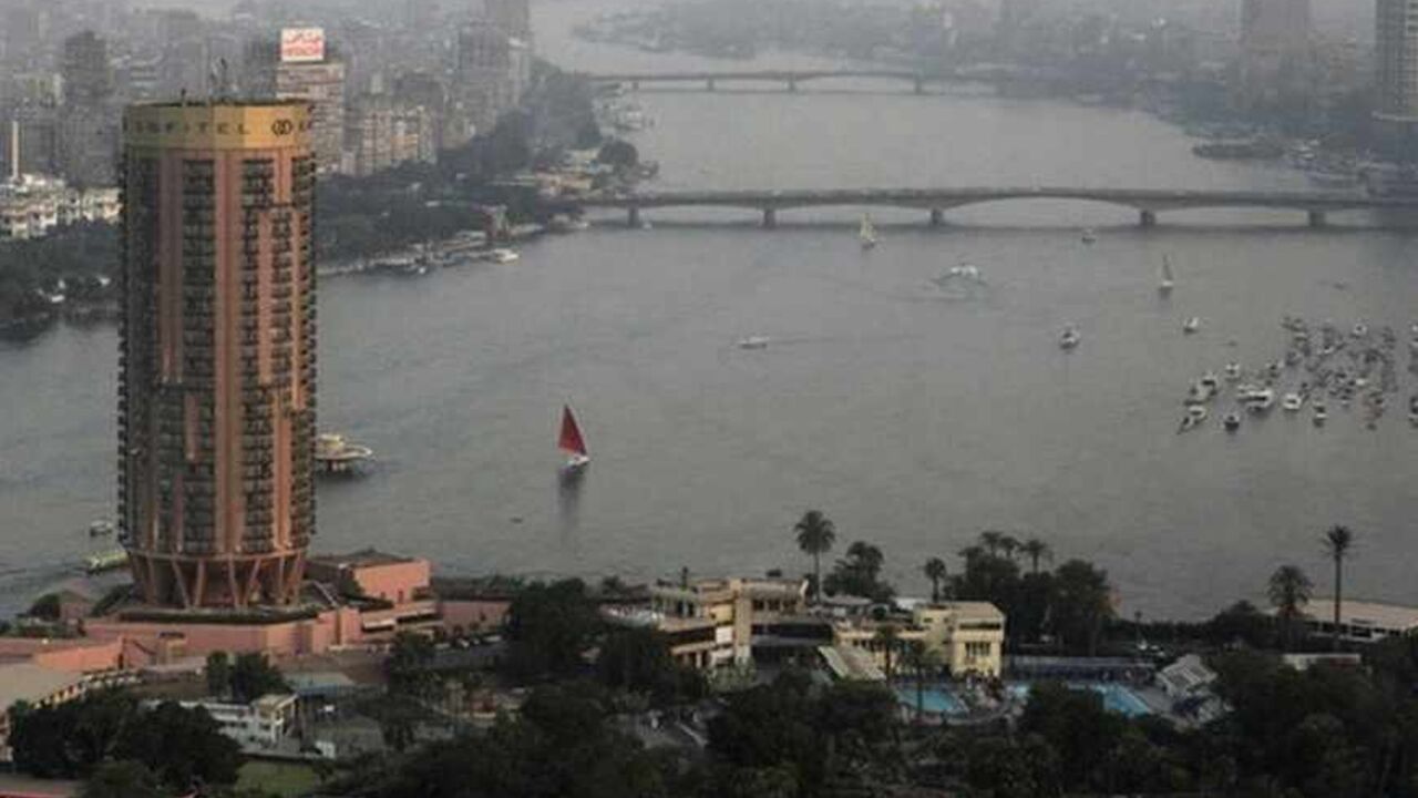 Boats sail on the river Nile in Cairo June 12, 2013. Most of Egypt's population live clustered around the Nile valley and delta, and the river is both a vital resource for the country's citizens, and a potent national symbol. In a recent dispute with Ethiopia over the construction of a dam upstream, Egypt's foreign minister Mohamed Kamel Amr underlined the country's reliance on the river's waters: "No Nile - no Egypt," he said. Picture taken June 12, 2013. REUTERS/Asmaa Waguih (EGYPT - Tags: POLITICS SOCIET