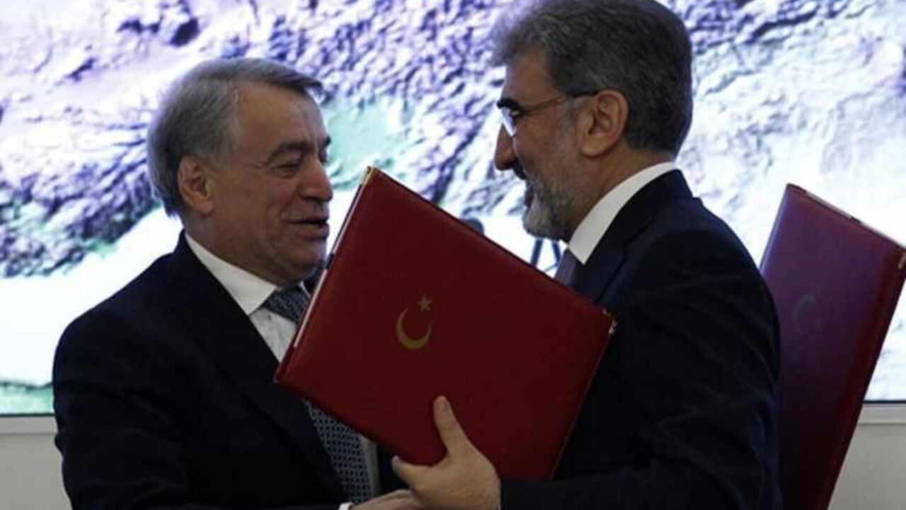 TURKEY-AZERBAIJAN/ Azeri Energy Minister Natik Aliev (L) and Turkish Energy Minister Taner Yildiz attend the signing ceremony of The Trans-Anatolian gas pipeline project in Ankara December 26, 2011. The Trans-Anatolian gas pipeline project, which will carry Azeri gas across Turkey to Europe, has a capacity of around 35 billion cubic metres (bcm) and can carry 16-24 bcm annually, officials from Turkey and Azerbaijan said on Monday. Azeri state energy company SOCAR, Turkey's state pipeline company Botas and Turkey's state energ