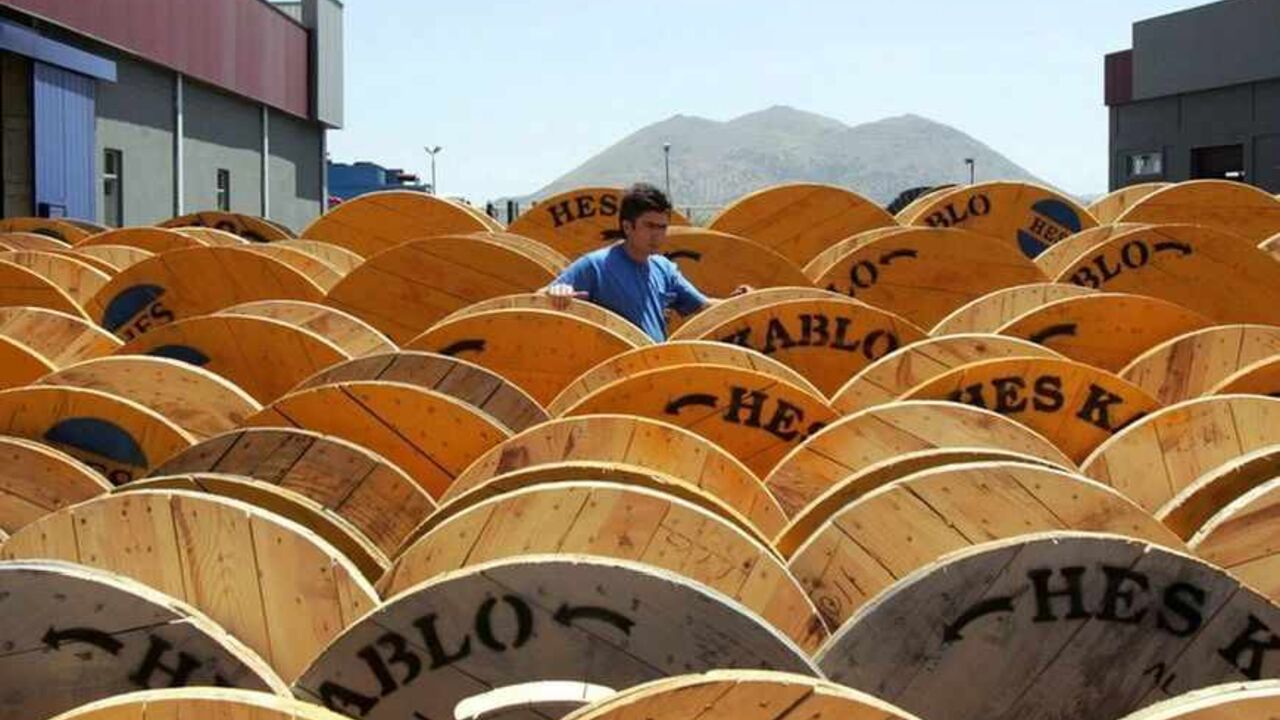 To match feature TURKEY CRISIS A worker checks cable drums at a factory in the city of Kayseri, central Turkey, June 27, 2006. The confident mood in Kayseri contrasts to the anxiety in Ankara, as they believe Turkey will weather the turbulence rocking its economy, resolve the tension between secularists and Islamists and stay the course to European Union membership. Picture taken June 27, 2006. To match feature TURKEY CRISIS REUTERS/Umit Bektas (TURKEY) - RTR1F0MZ
