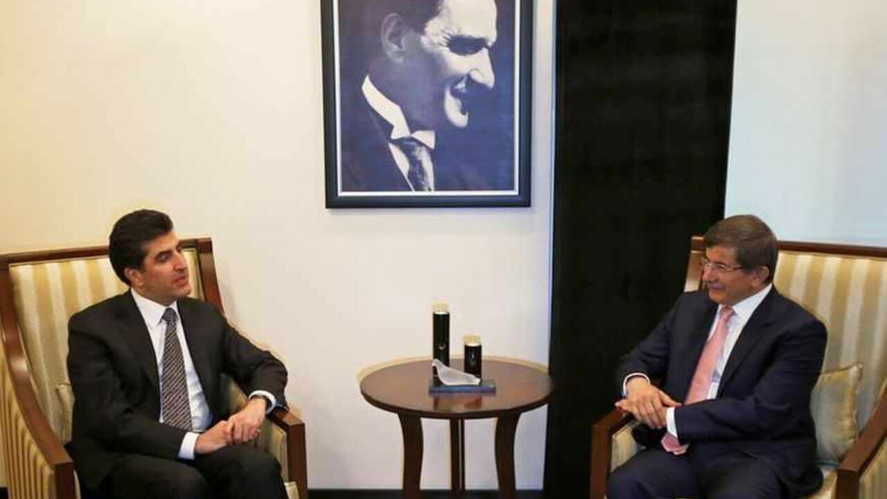 Turkey's FM Davutoglu meets with Iraq's Kurdish Regional Government PM Barzani in Ankara Turkey's Foreign Minister Ahmet Davutoglu (R) meets with Iraq's Kurdish Regional Government (KRG) Prime Minister Nechirvan Barzani in Ankara July 30, 2013. REUTERS/Umit Bektas (TURKEY - Tags: POLITICS) - RTX1252R