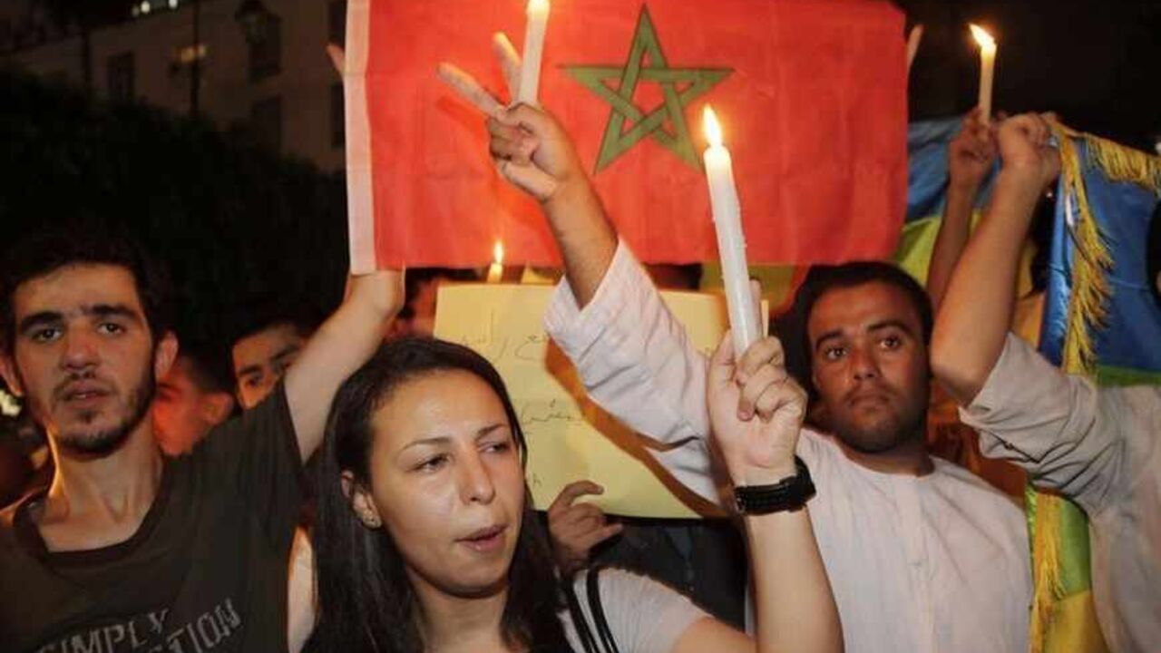 Protesters chant slogans during a sit-in against an initial royal pardon for a Spanish paedophile in Rabat Protesters chant slogans during a sit-in against an initial royal pardon for a Spanish paedophile in Rabat, late August 7, 2013. Spanish police have arrested convicted paedophile Daniel Galvan Vina, who was serving a 30-year sentence in Morocco but was among 48 jailed Spaniards pardoned by Morocco's King Mohamed VI last week in what Spain said was a mix-up. The pardon was revoked by the king on Sunday following a protest in front of parliament on Friday over the decision to release Galvan, who had raped and