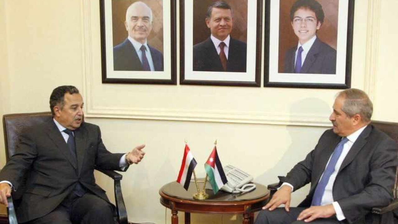 Jordanian Foreign Minister Nasser Judeh meets with his Egyptian counterpart Nabil Fahmy in Amman Jordanian Foreign Minister Nasser Judeh (R) meets with his Egyptian counterpart Nabil Fahmy in Amman August 25, 2013. REUTERS/Majed Jaber (JORDAN - Tags: POLITICS) - RTX12VU1